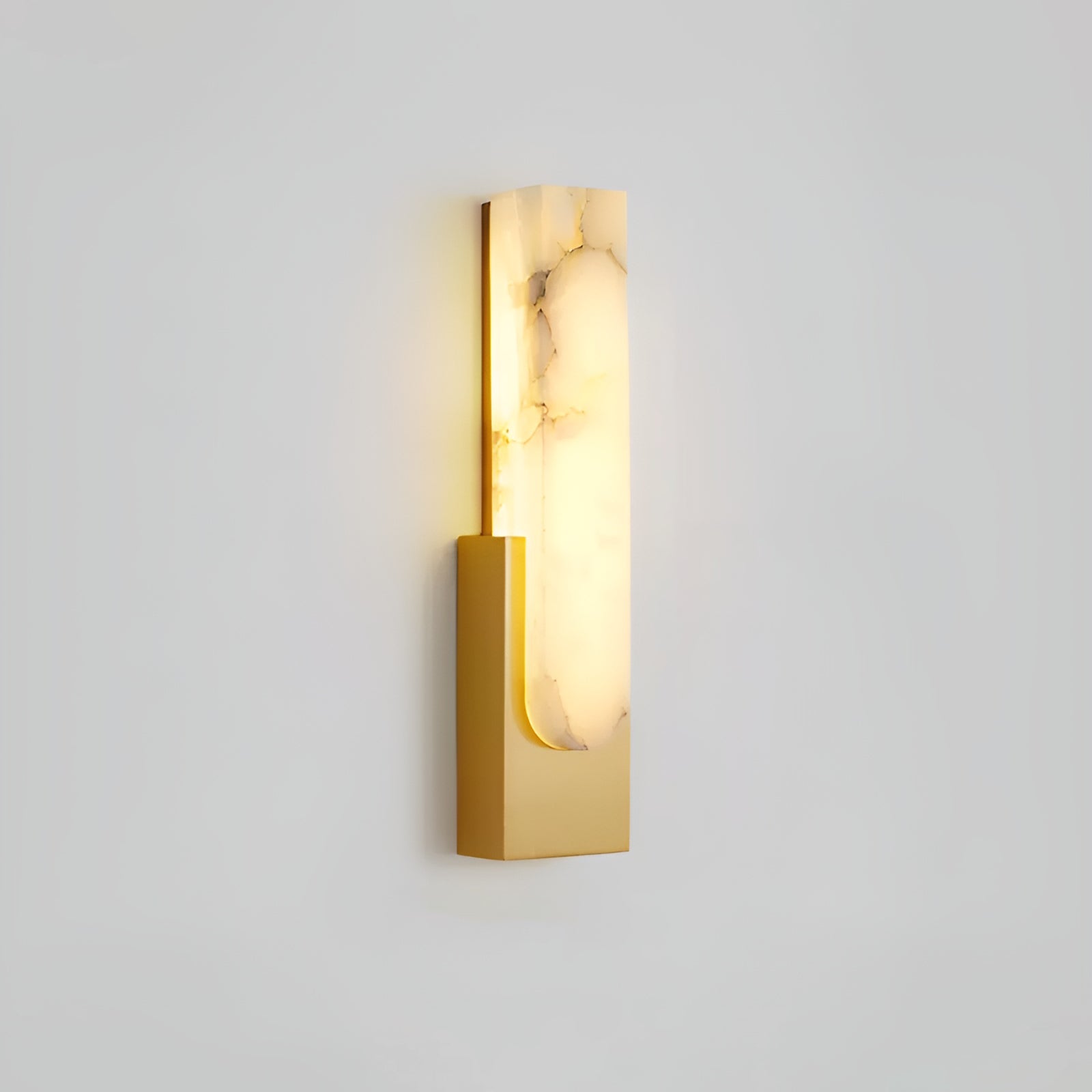 Close-up of the veined alabaster shade on the Mali alabaster LED wall sconce