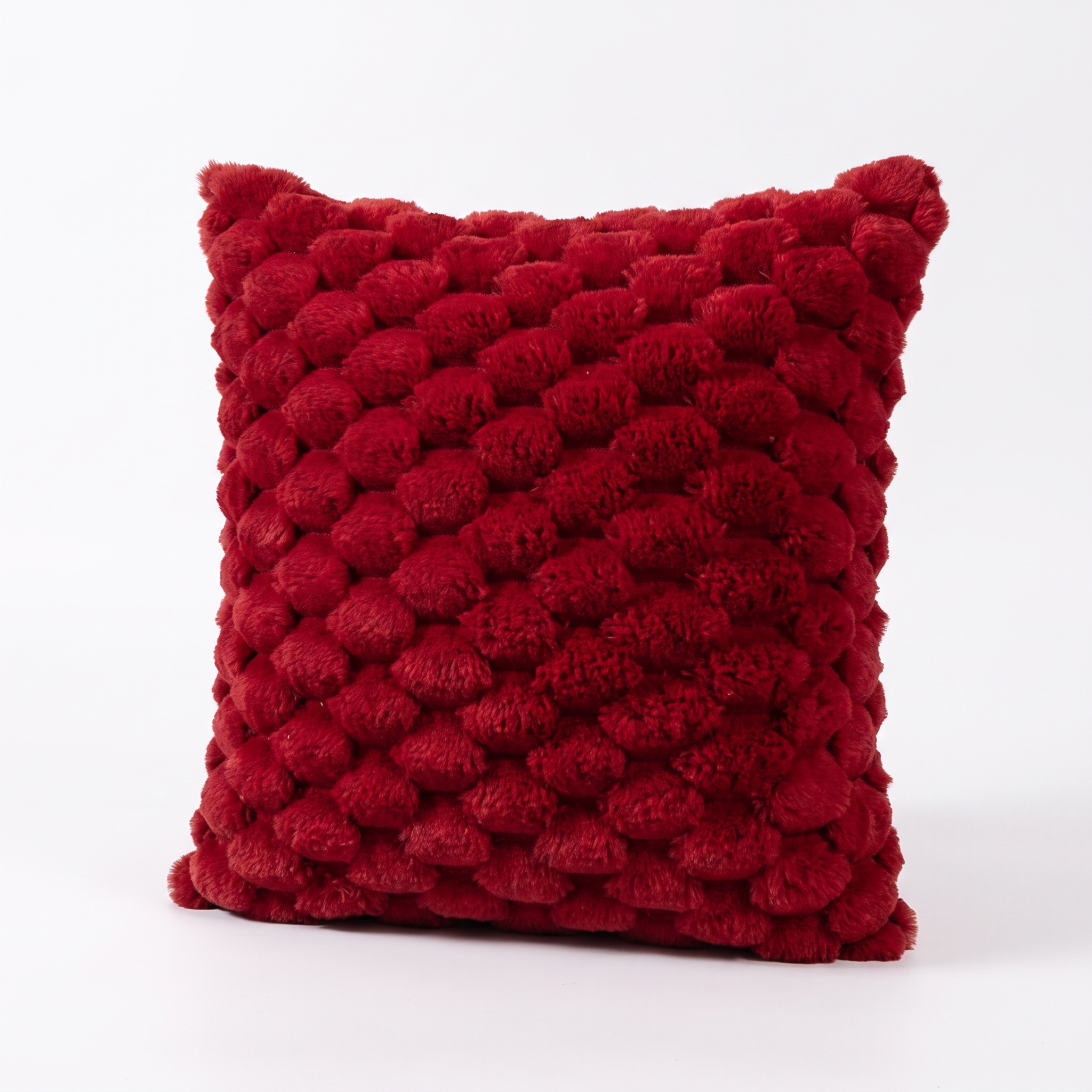 Maria plush 3D textured cushion cover in red on a white background