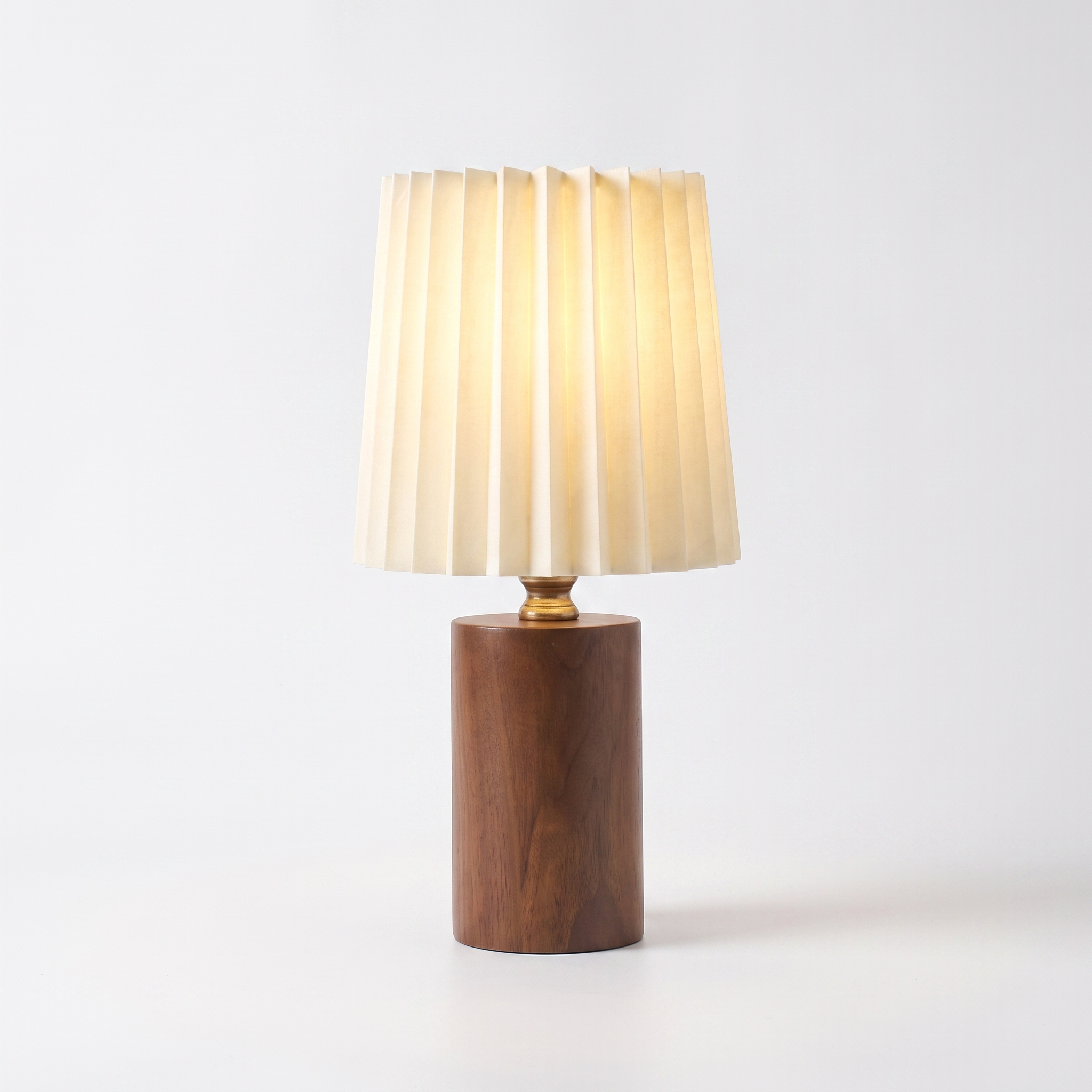 Marlo solid wood pleated-shade table lamp in walnut on a white background