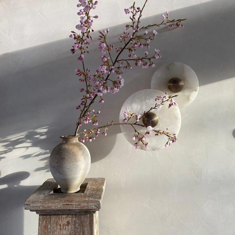 Close-up of the natural veining in the alabaster shade on the Miki round wall light
