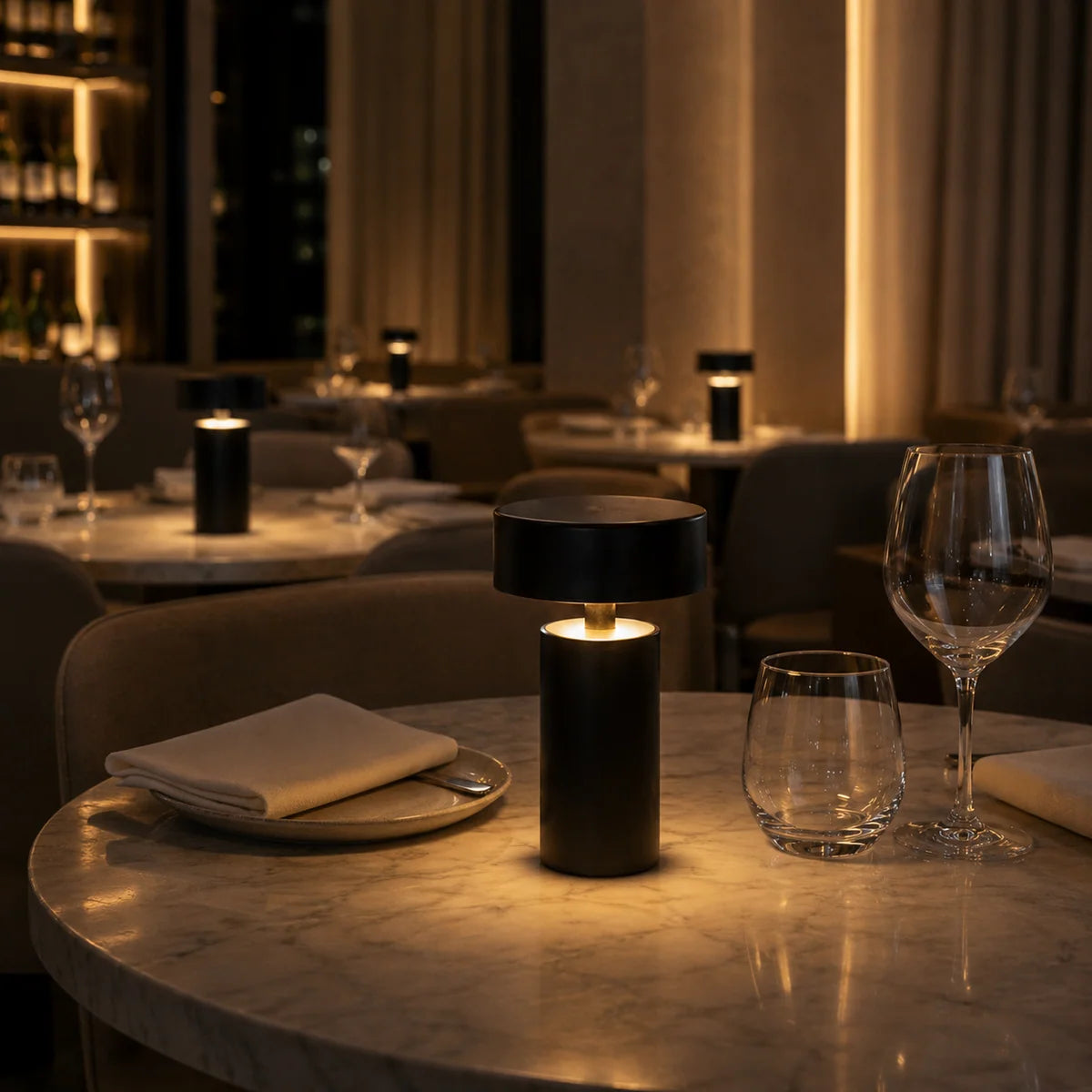 Mona portable table lamp in silver finish on side table