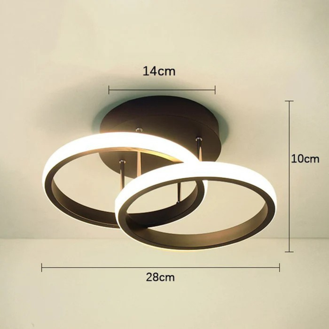 Dimension diagram of the black double ring Monni LED ceiling light, 28 cm wide and 10 cm deep with a 14 cm canopy