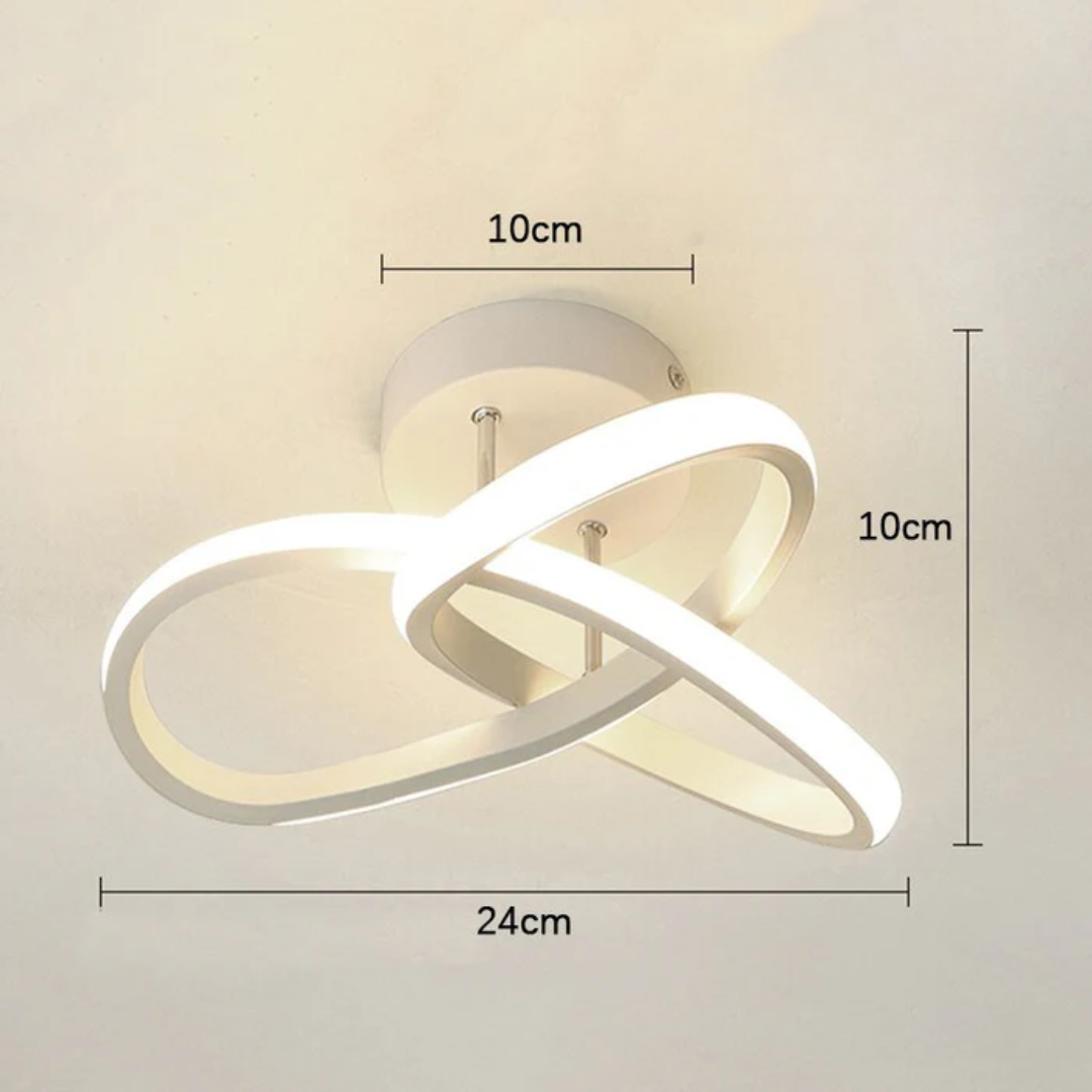 Dimension diagram of the white Monni LED ceiling light, 24 cm wide and 10 cm deep with a 10 cm canopy