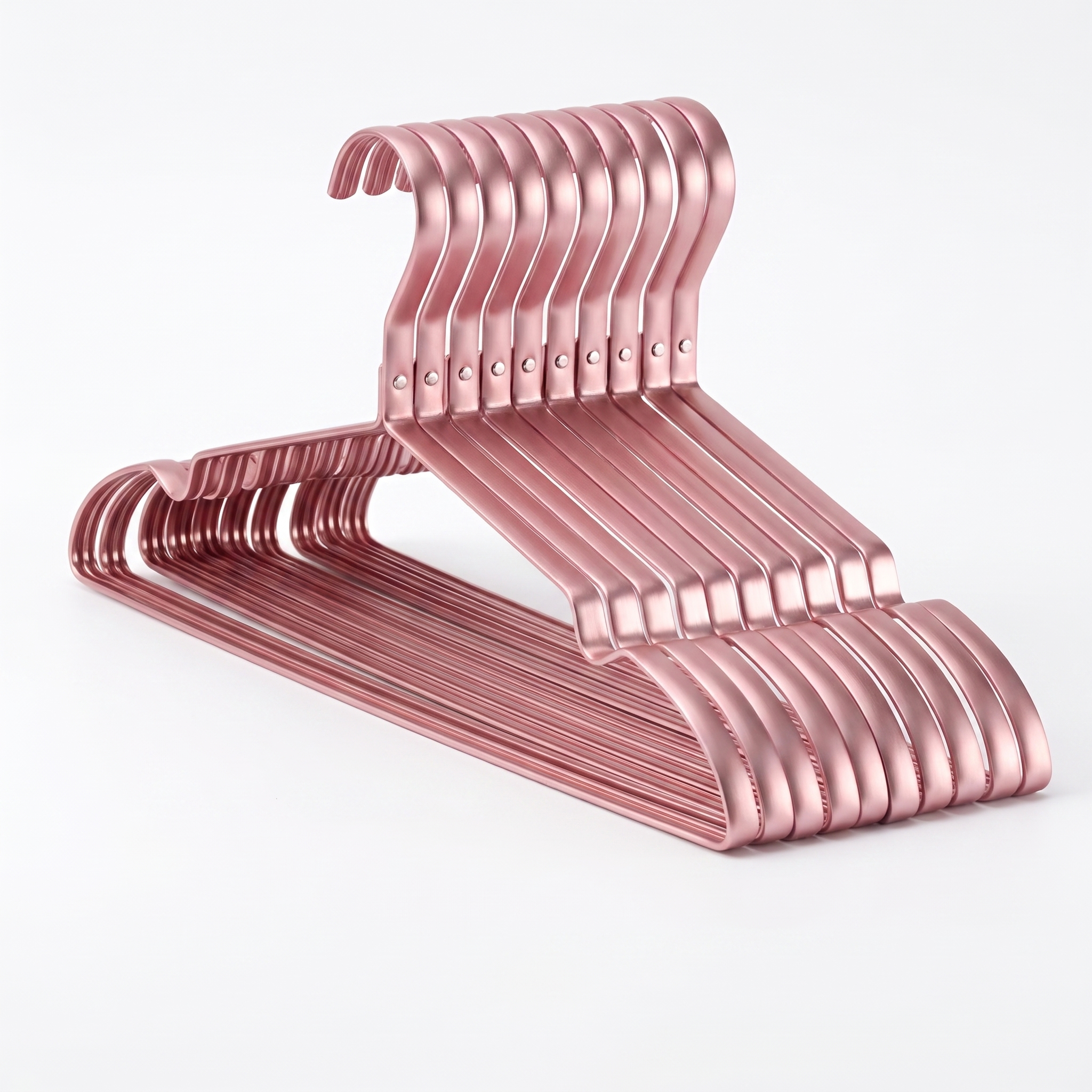 Ness rose pink aluminium clothes hangers shown as a set on a plain white background