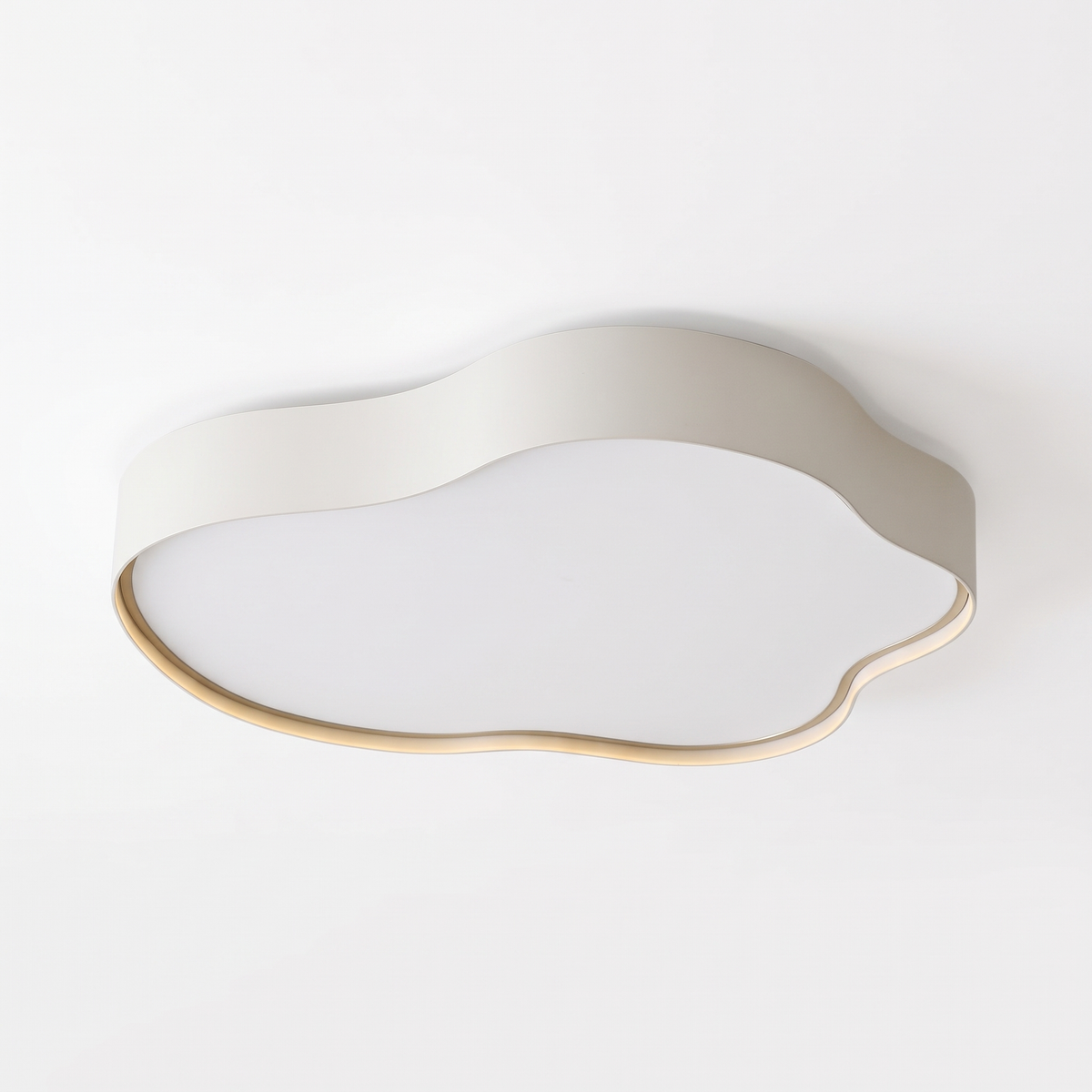 Ness LED ceiling light on a plain white background showing its scalloped cloud-shaped matte white profile