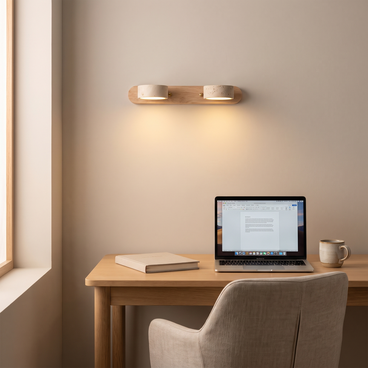 Notu travertine wall light in light wood with two pucks above a home office desk