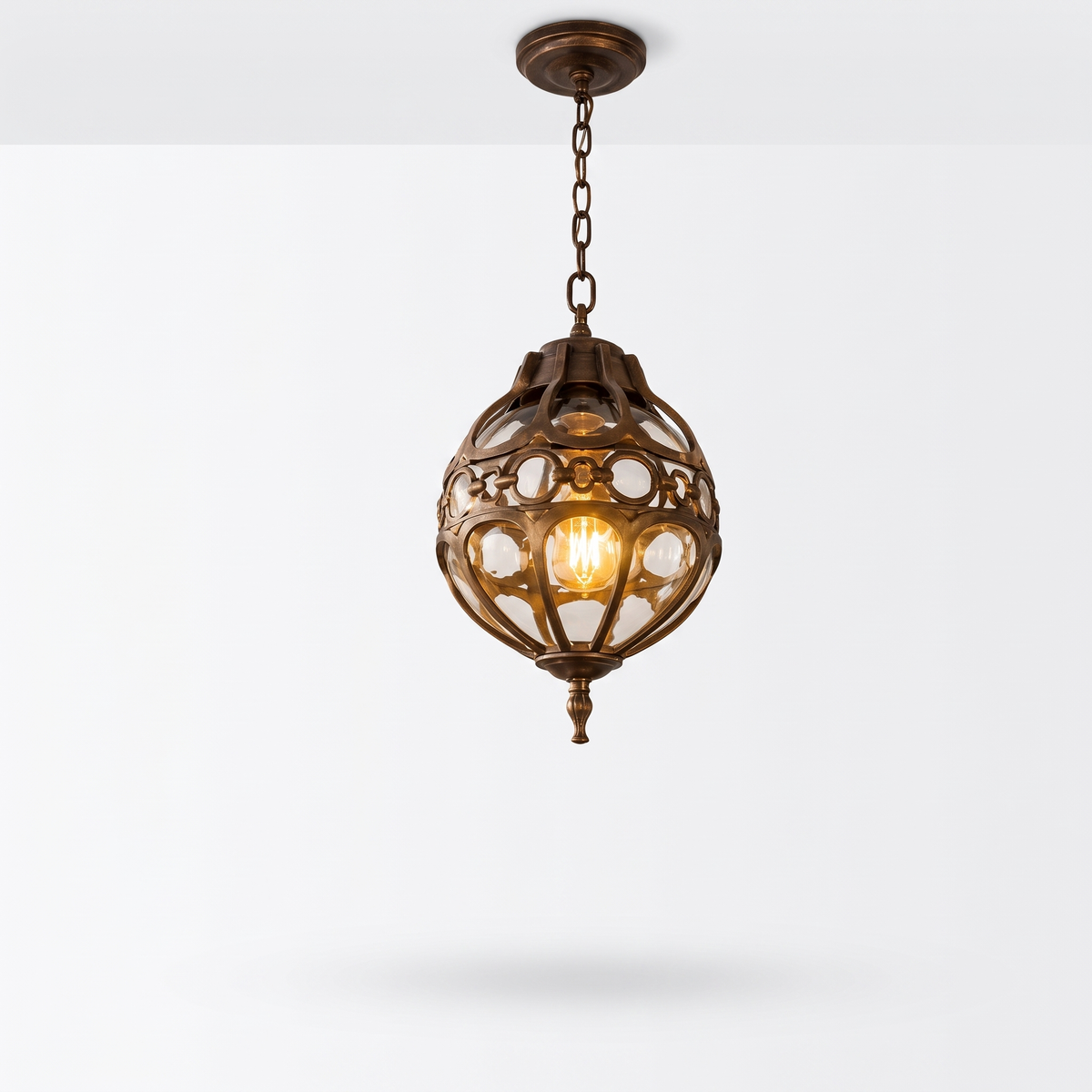 Olly vintage glass globe outdoor pendant in bronze on a white background