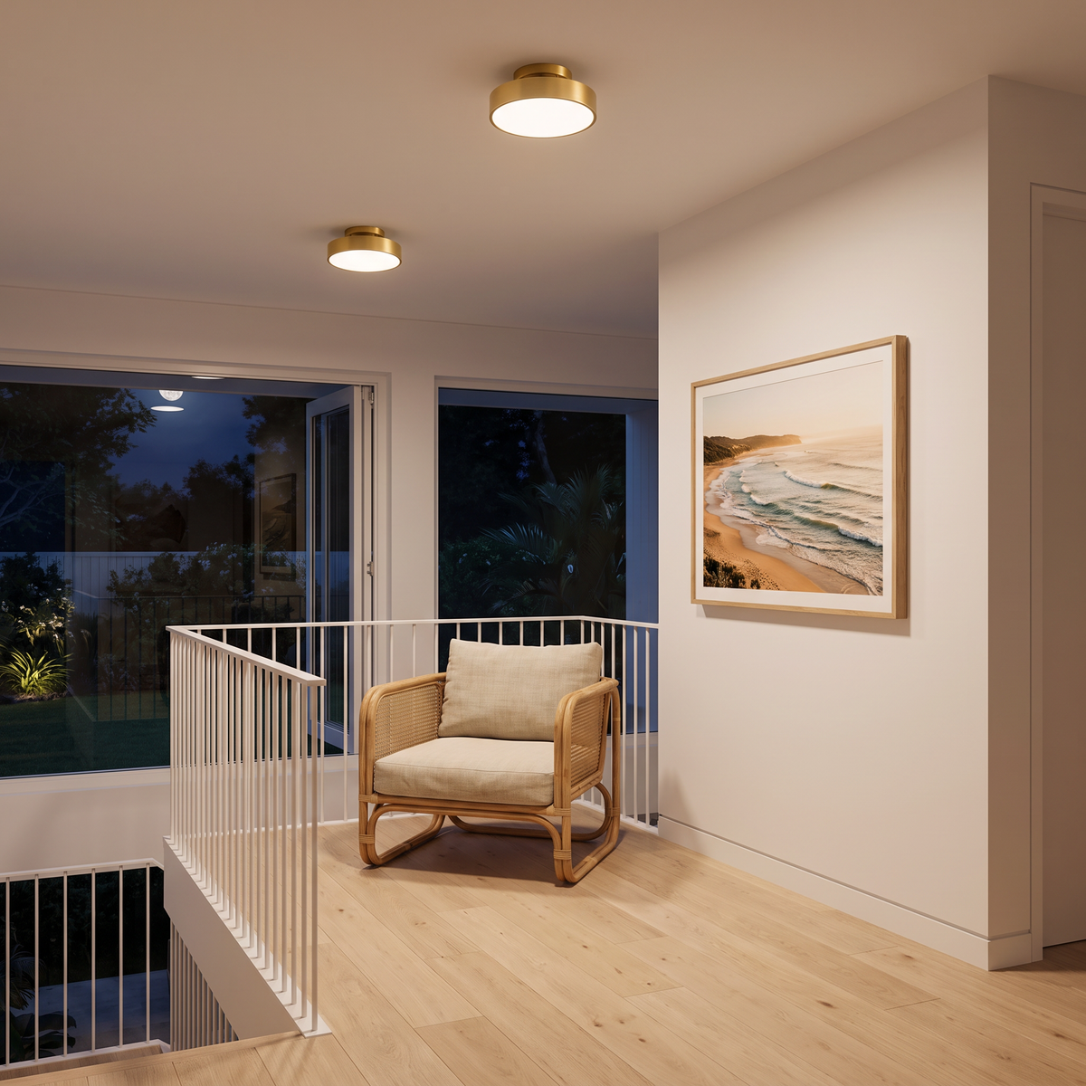 Two 12cm Onslow gold LED flush mount lights glowing over a coastal upstairs landing at night