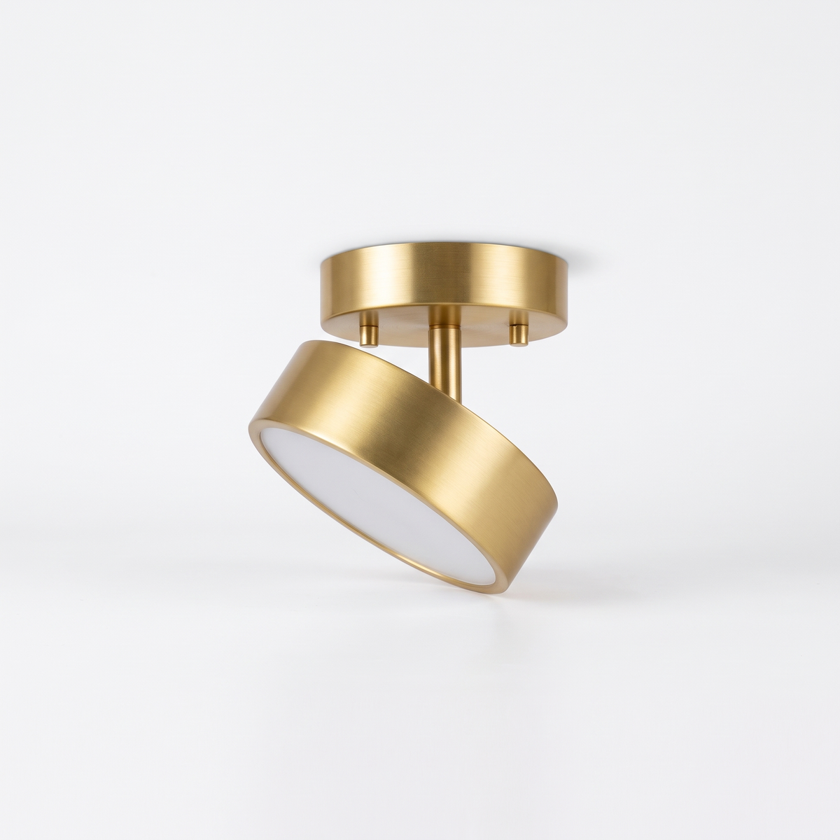 Onslow 12cm gold adjustable LED flush mount ceiling light on a white background