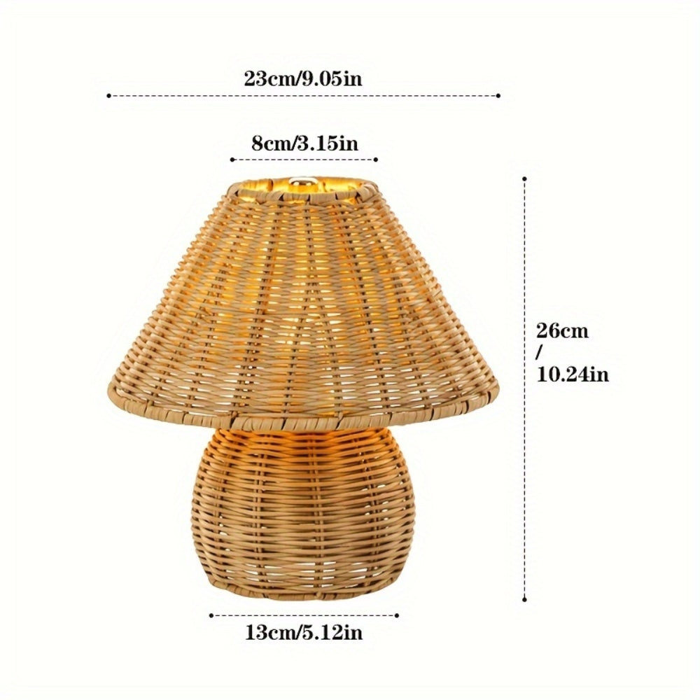 Palma rattan table lamp casting filtered warm light through its open weave