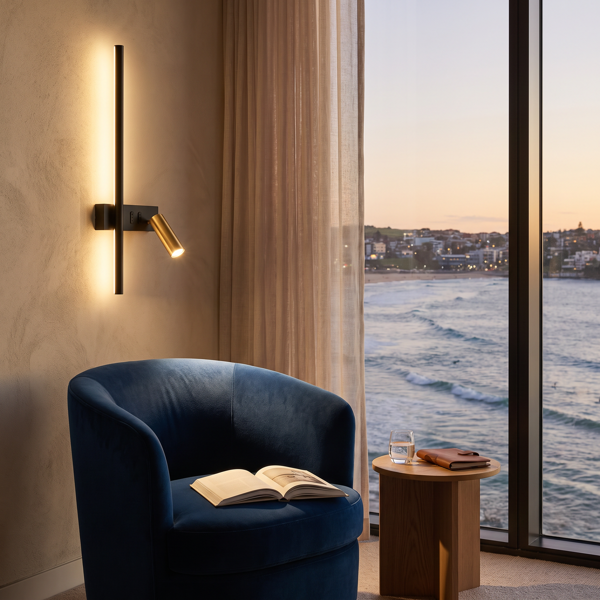 Preso LED wall reading light in a hotel suite reading corner