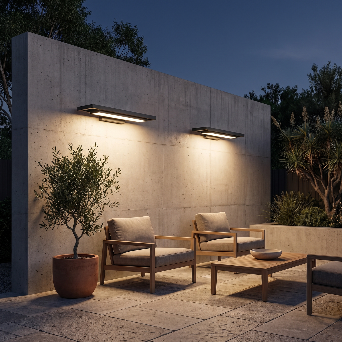 Two Shan outdoor wall lights, 55cm, on board-formed concrete above an outdoor lounge at night