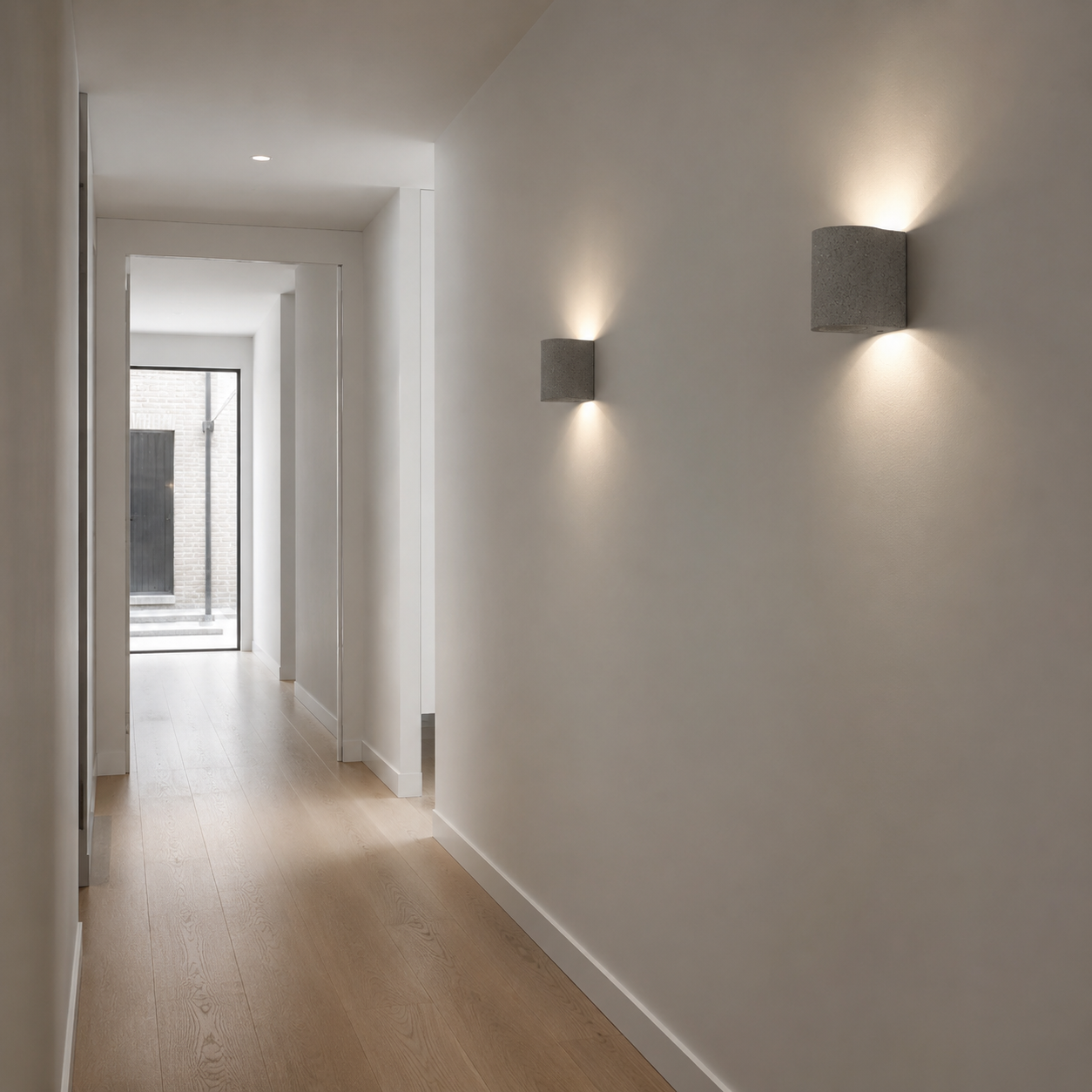 Stork wall light in Cement finish