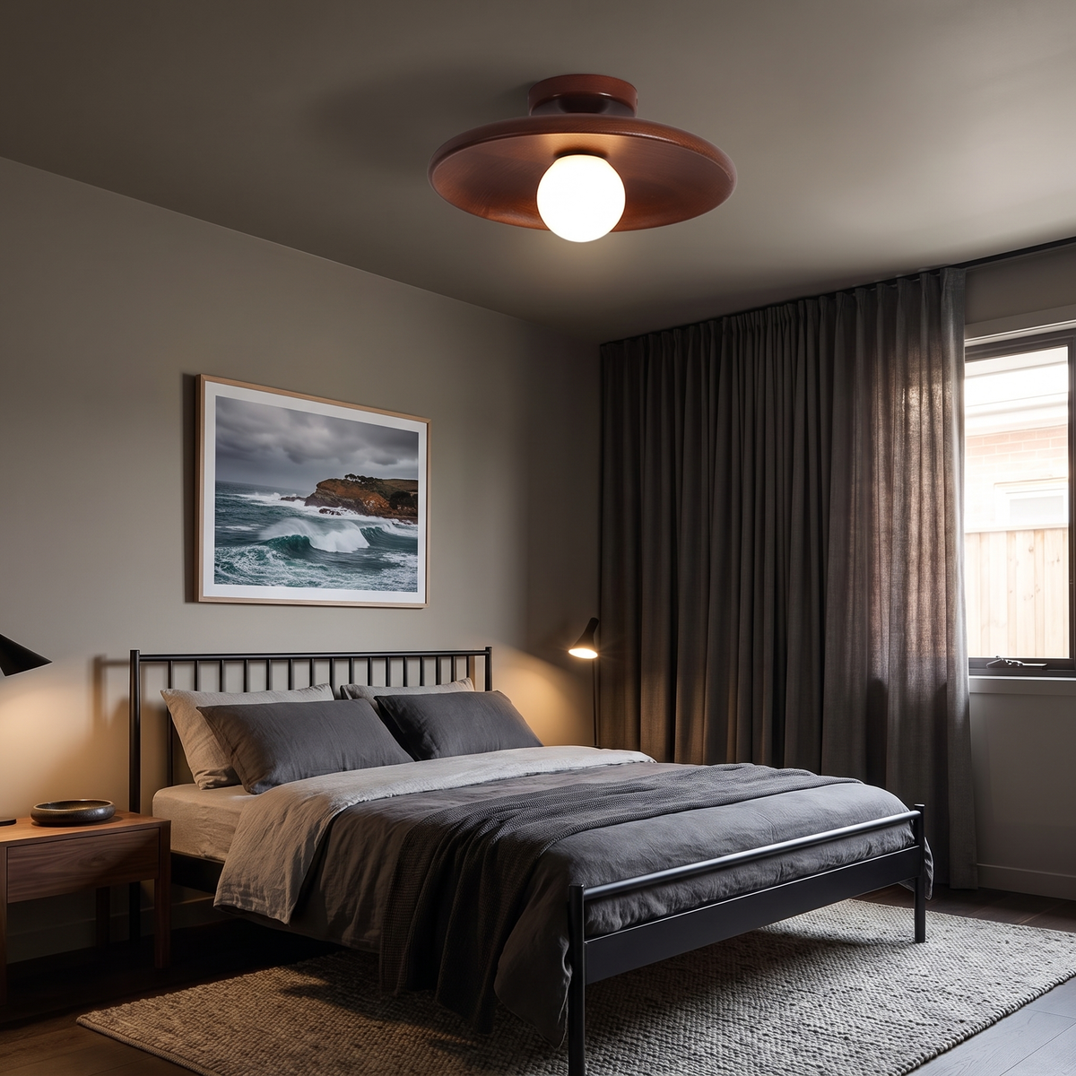 Suma walnut timber ceiling light in a moody bedroom with a black metal bed frame