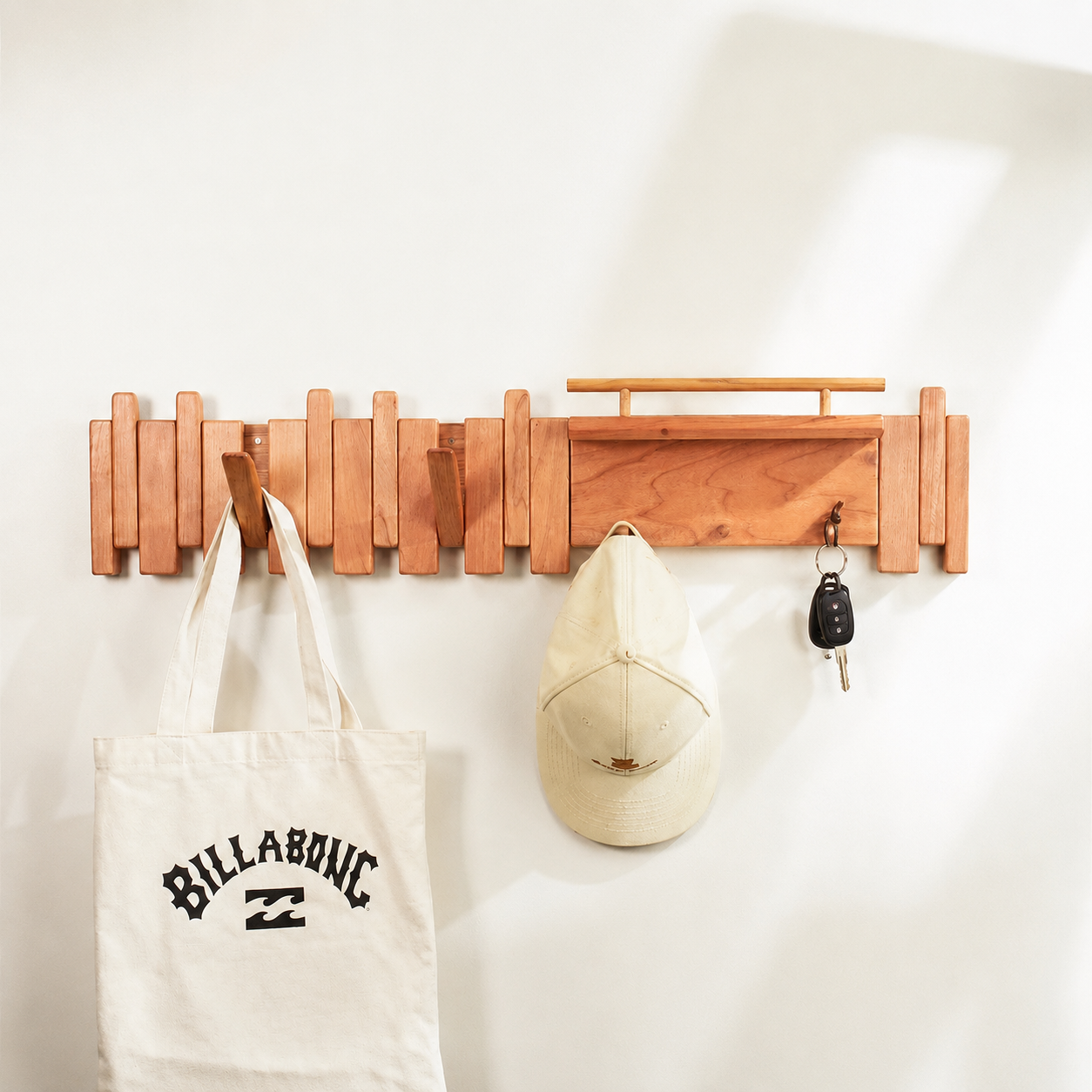 Close-up of the piano key hook design on the Tal Wooden Coat Rack