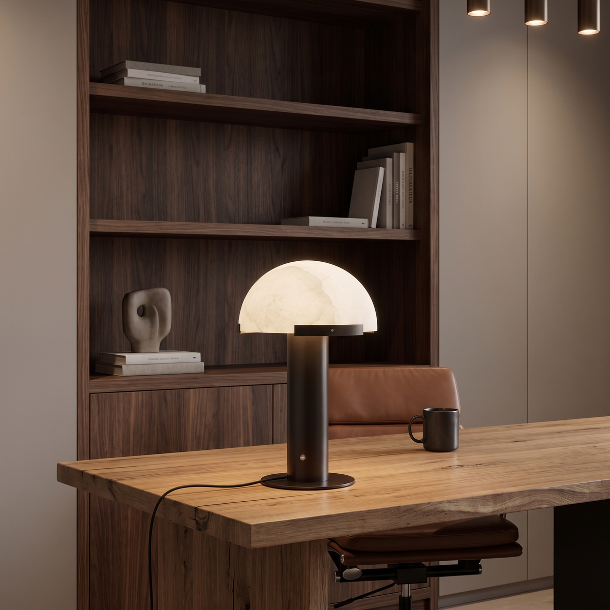 Taya alabaster table lamp with black bronze base on a timber desk in a home office