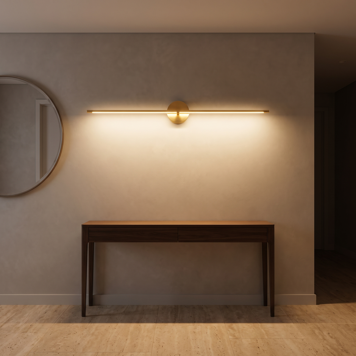 Tomi linear wall sconce in gold above a bathroom mirror in a Scandinavian interior