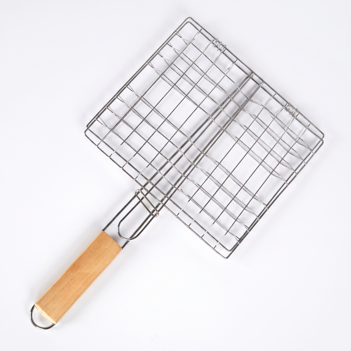 Toni flat grilling basket, a hinged stainless steel BBQ rack with timber handle, on a white background