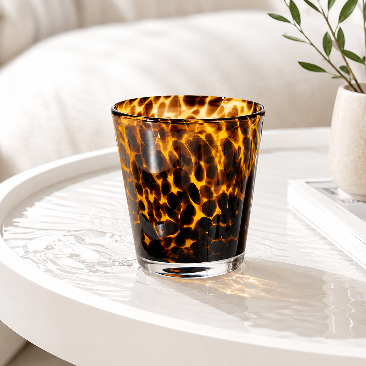 Velor Drinking Glass with leopard print design on a bar cart