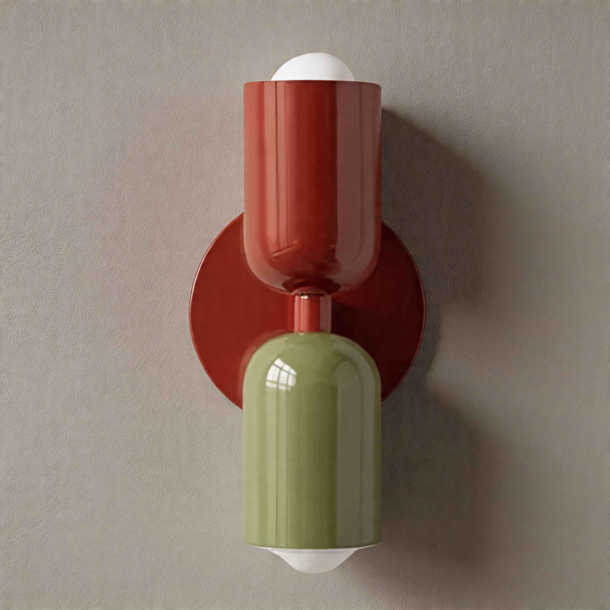 Vic Nordic up down wall sconce with a red wall plate, red upper shade and green lower shade