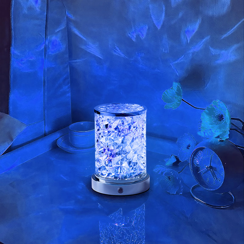 Wave Atmospheric Lamp illuminated on a bedside table