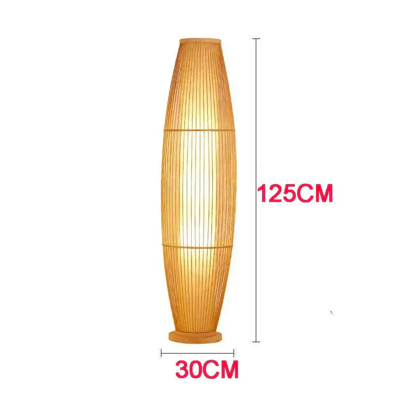 Kosci woven bamboo floor lamp with a handwoven bamboo shade in a cosy living room setting