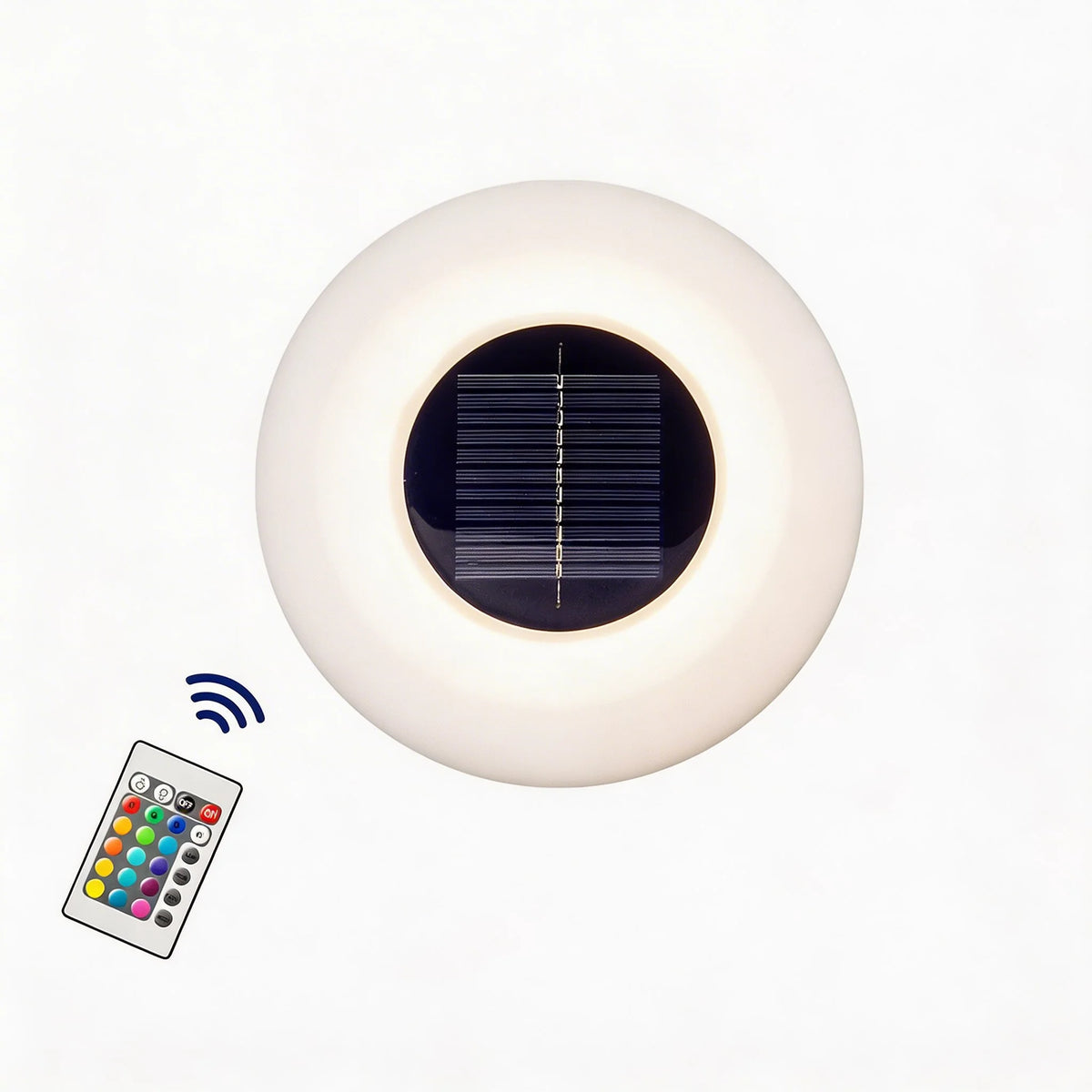 Agua floating solar pool light from above showing the round solar panel and colour remote control
