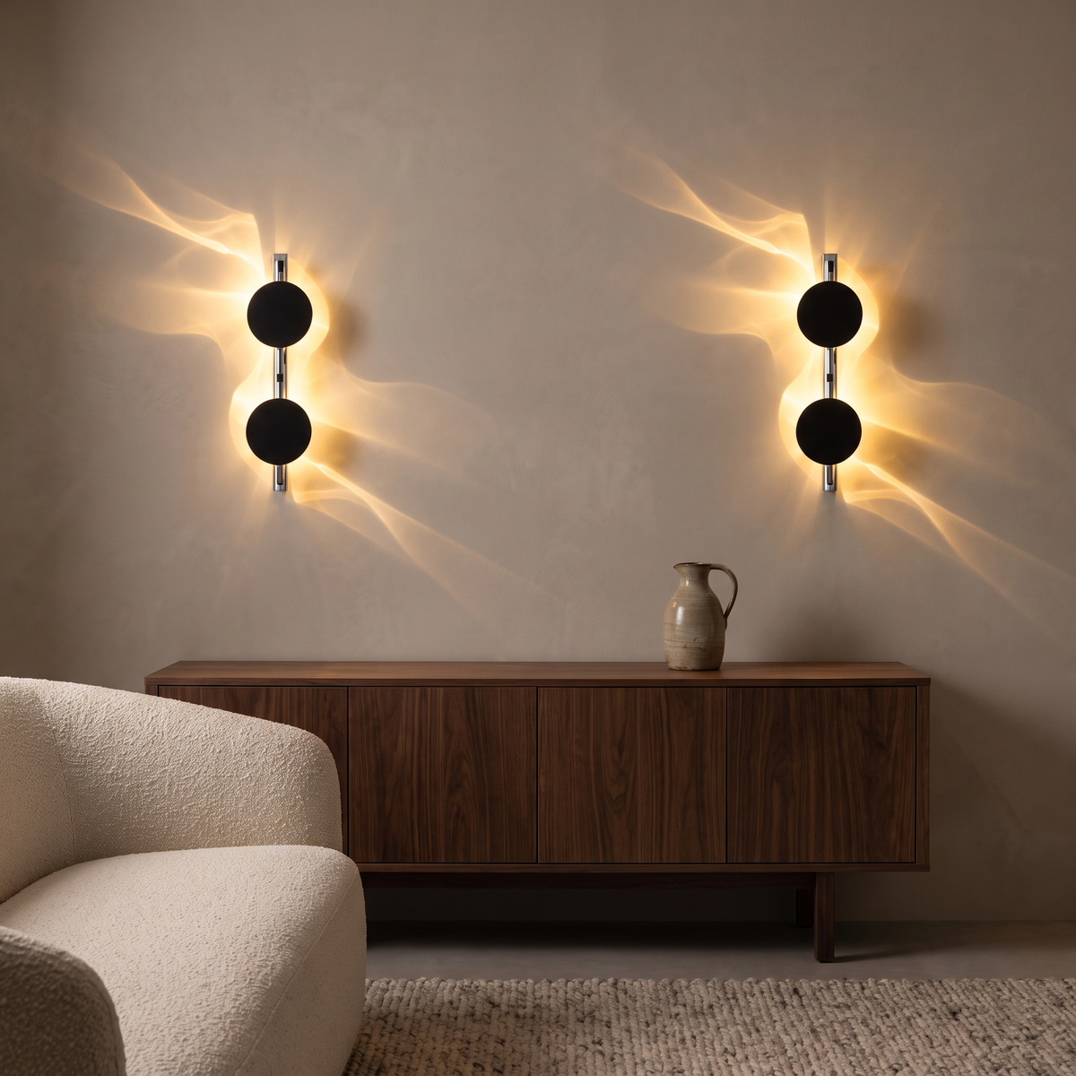 Two double Alya LED wall sconces above a walnut sideboard in a living room