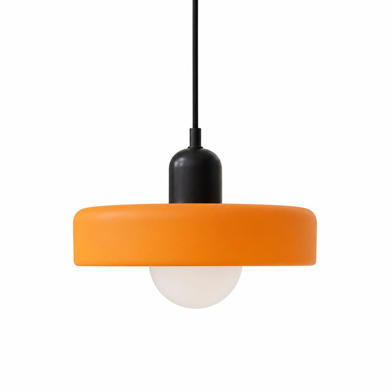 Annie Bauhaus-Inspired Coloured Glass Pendant Light suspended above a dining table