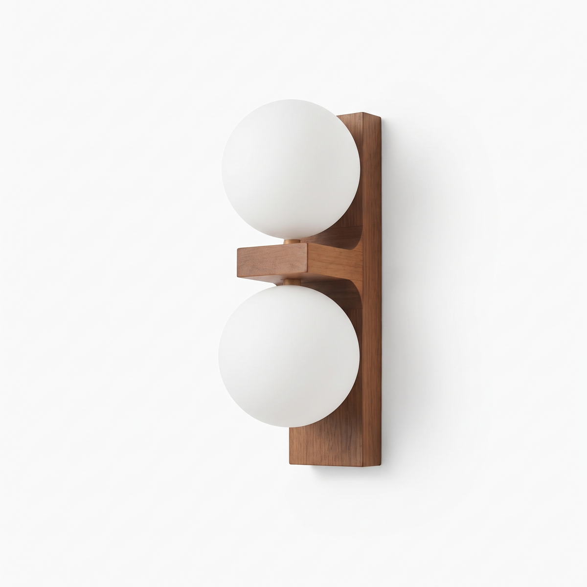 Aria 22cm walnut wall light with two stacked opal glass globes on a white background