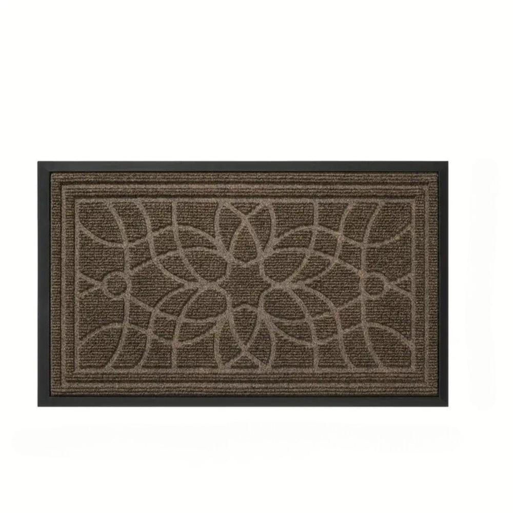 Bella mandala doormat sitting low under a standard door
