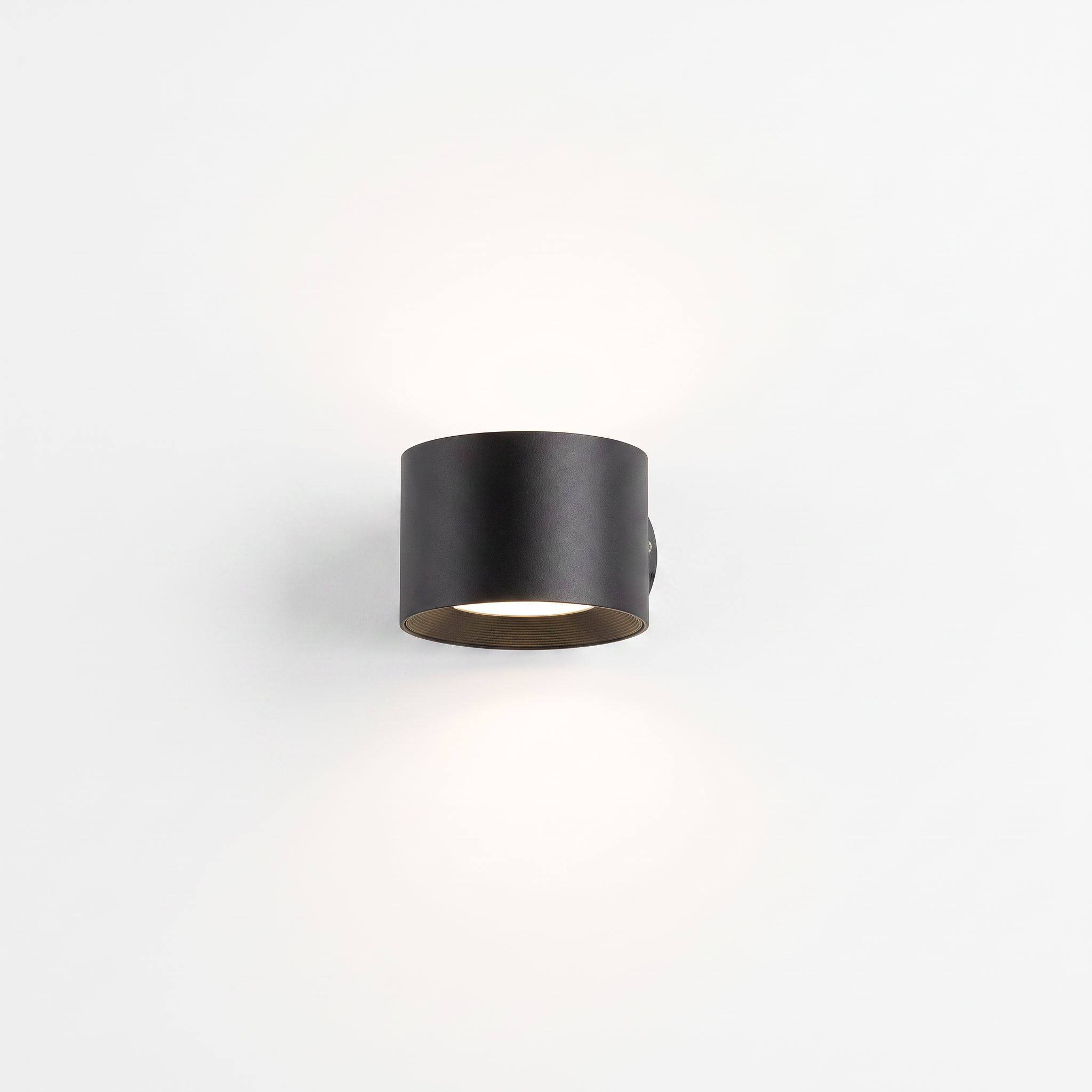 Belmont dual-direction LED wall sconce in black on a white background