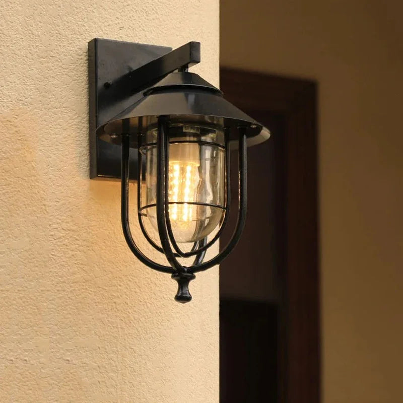 Cala Iron & Glass Outdoor Wall Light with clear tempered glass shade