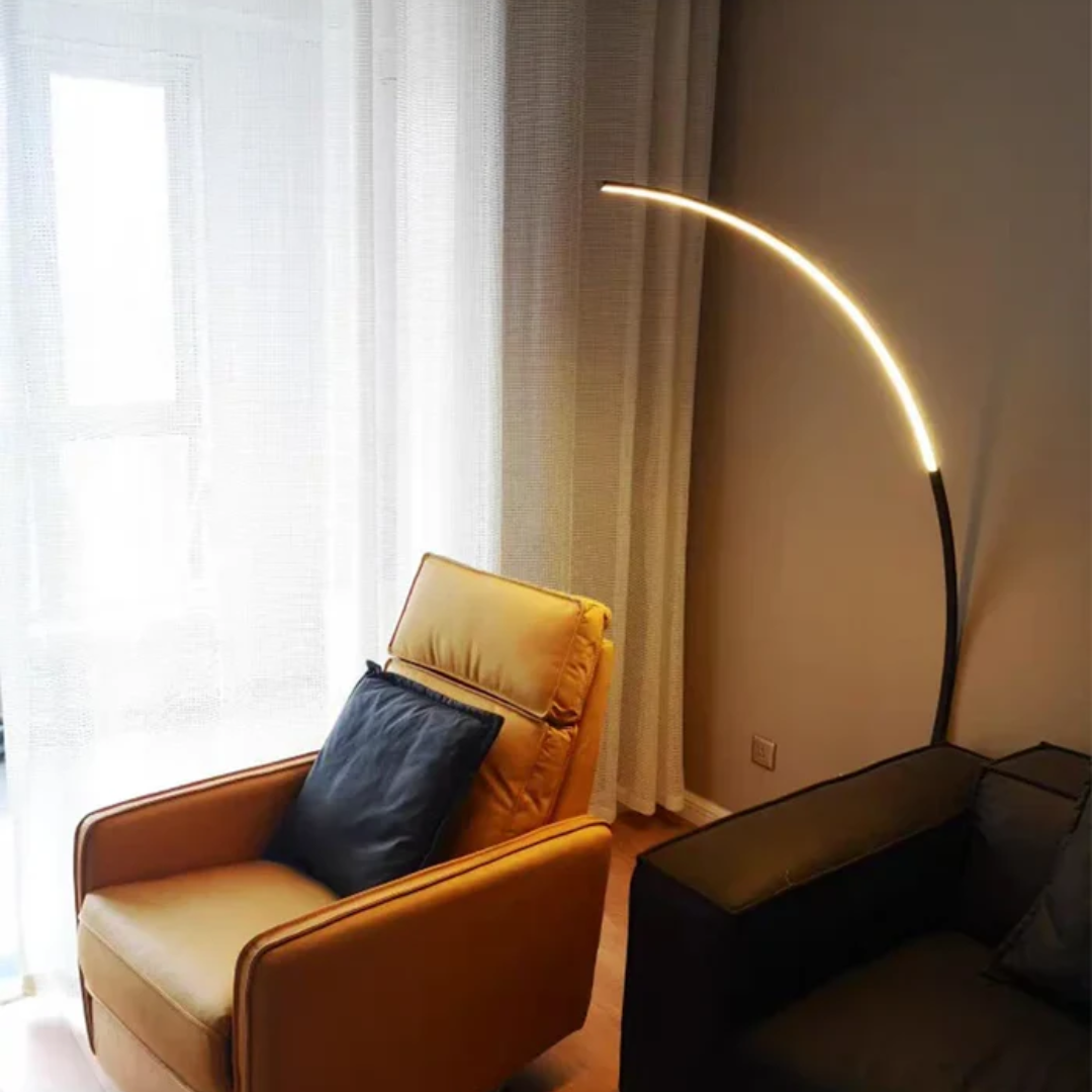 Clayton floor lamp glowing with warm white light