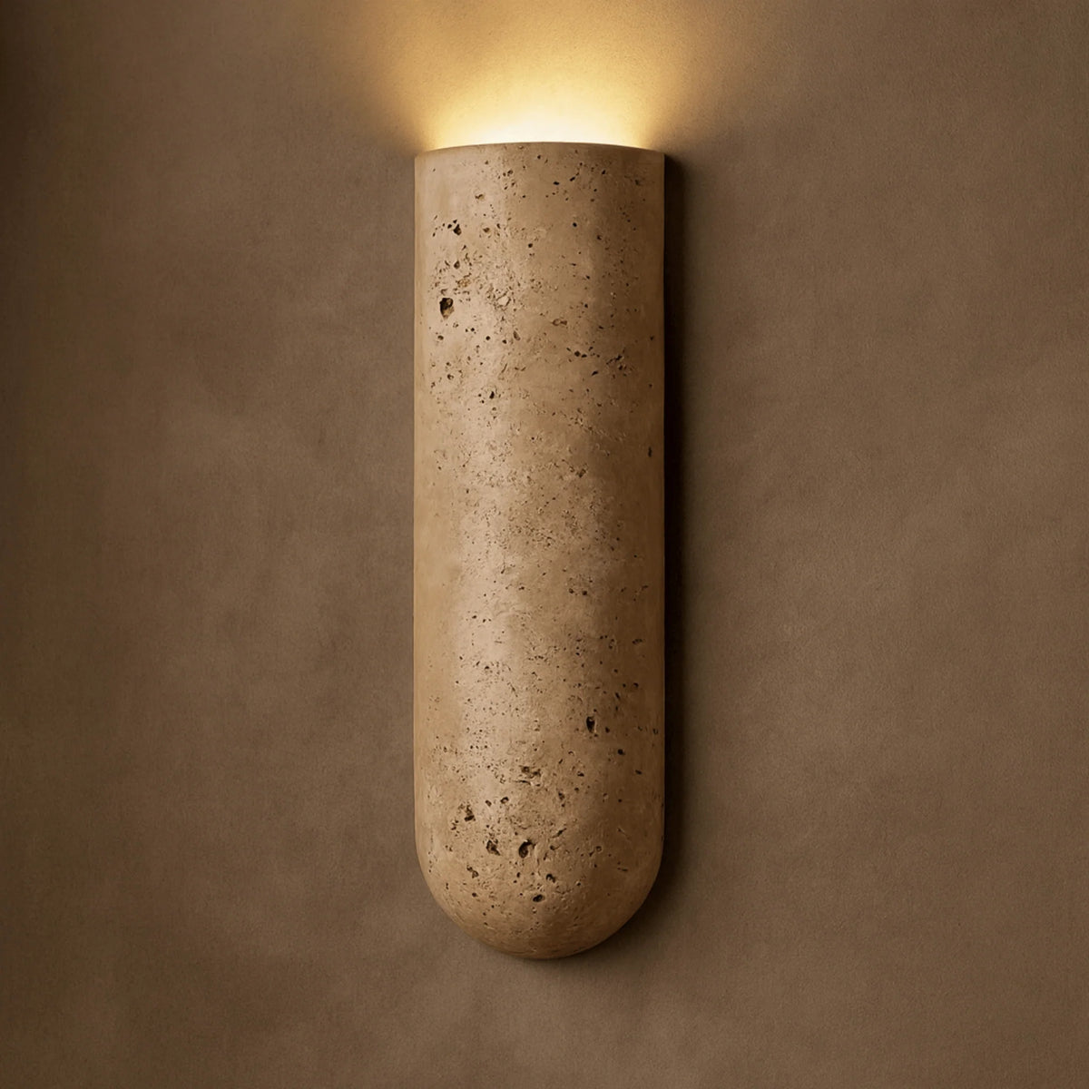 Colly travertine wall light in the lampshade up version washing light up the wall