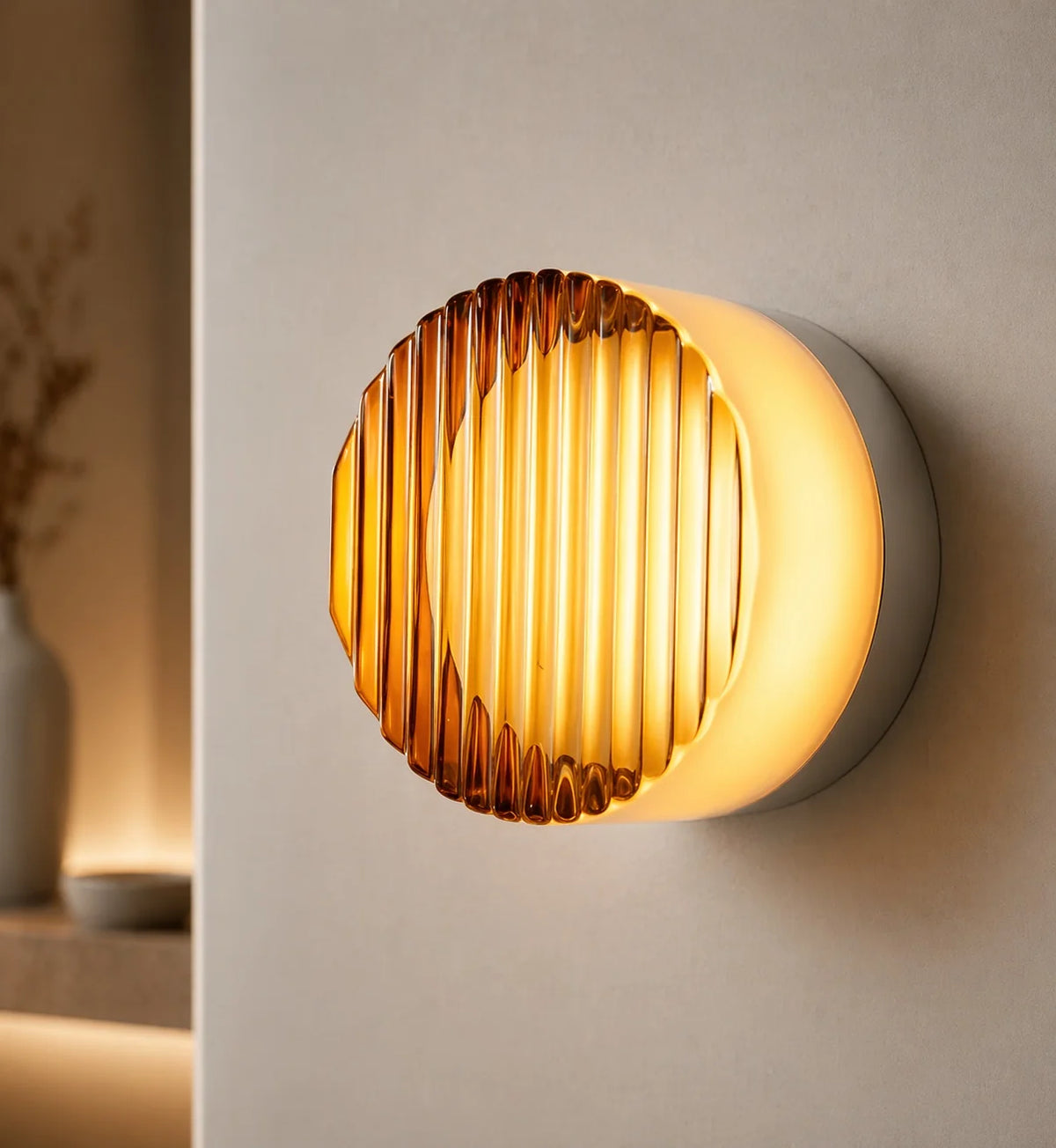 Comu golden amber Lines ribbed glass sensor wall light casting a warm striped glow