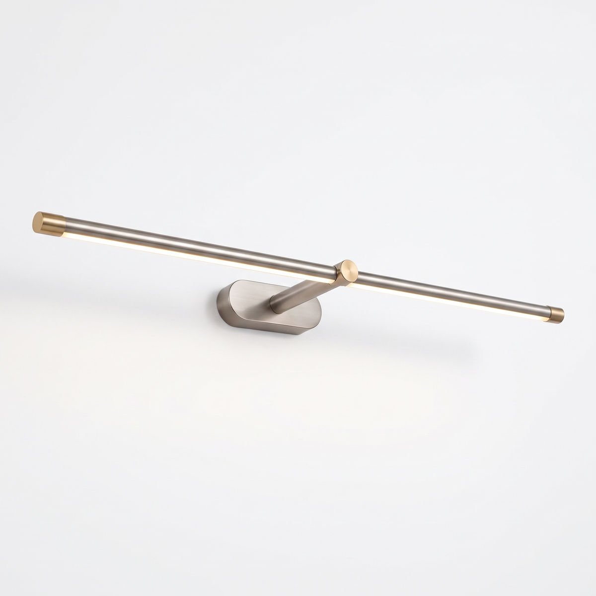 Debi brushed nickel wall lamp with gold end caps and knuckle on a plain white background