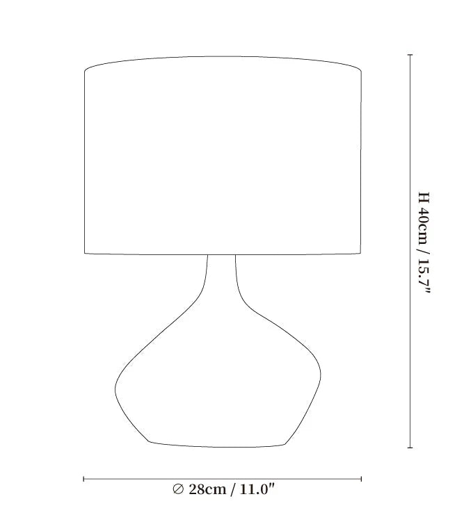 Dune artisan sculptural ceramic table lamp with a matte-black base and natural linen drum shade