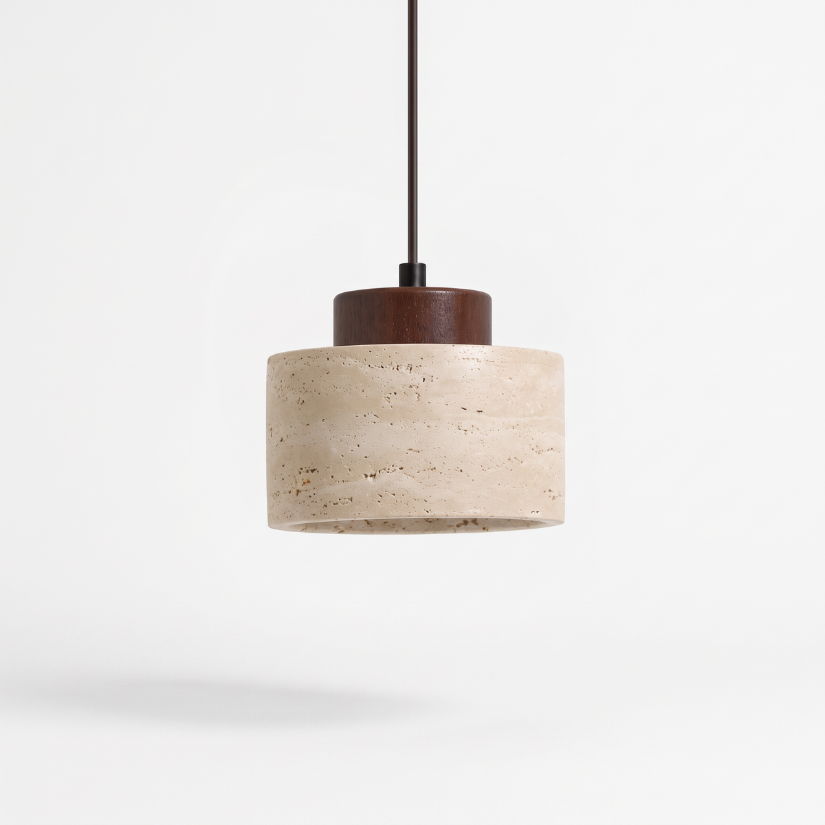Dural short natural travertine pendant light with walnut cap on a white background
