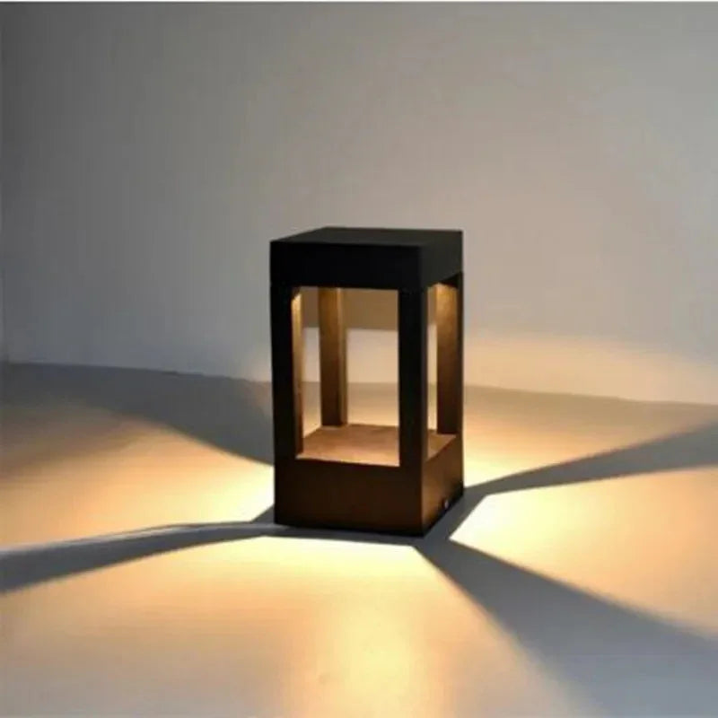 Eclipse LED Garden Bollard Light styled along a driveway