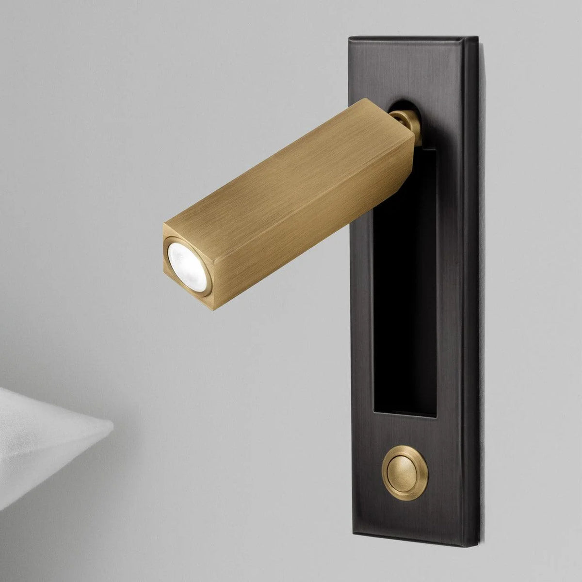 Espy LED reading wall light in square black brass with a brass arm and switch