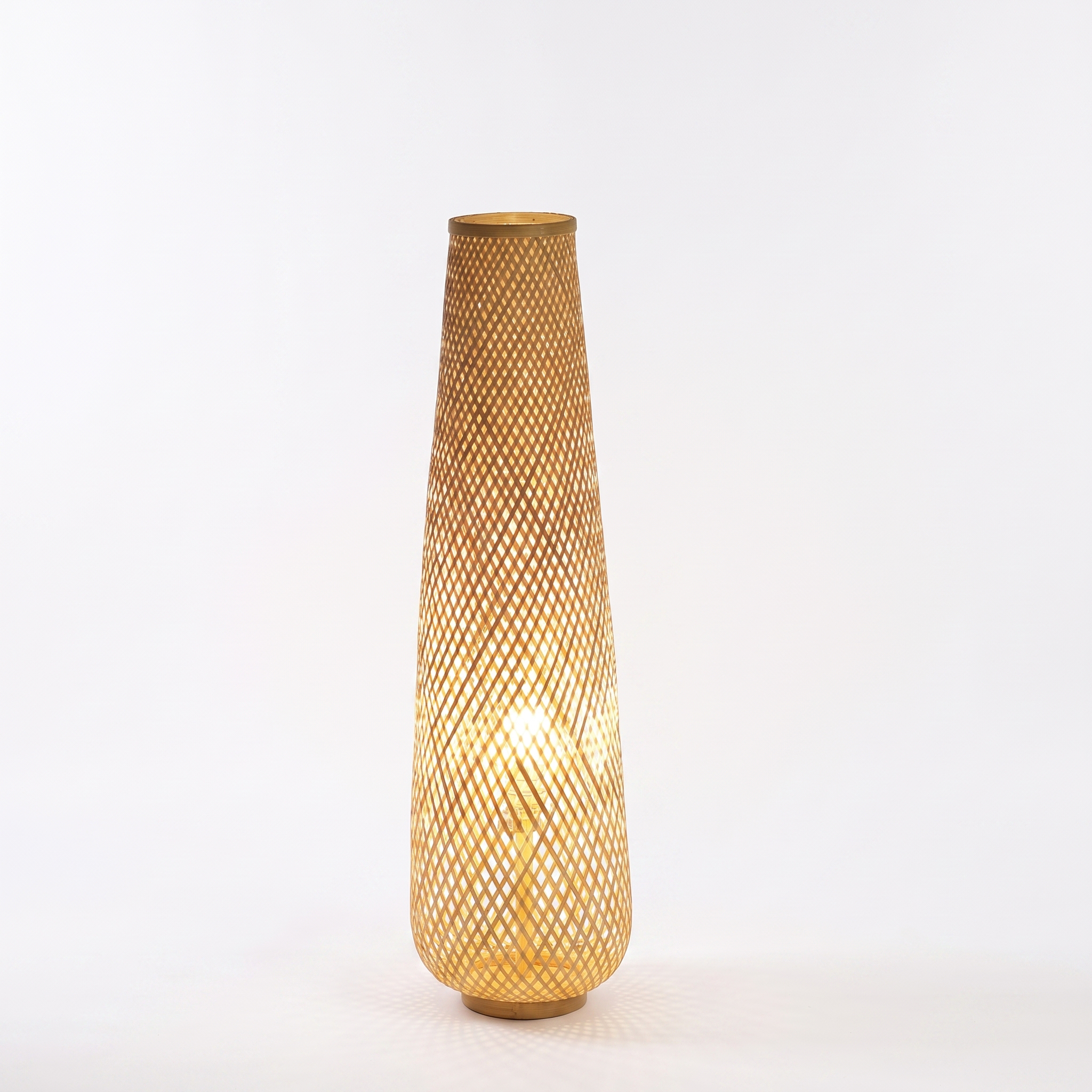 Gibbo bamboo woven cylinder floor lamp on a white studio background