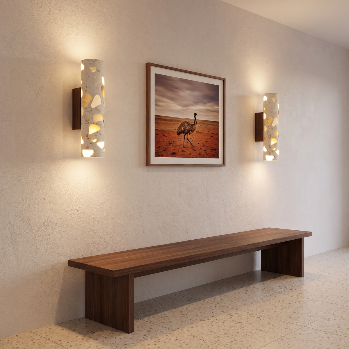 Hally terrazzo wall sconces glowing above a walnut bench in a hallway