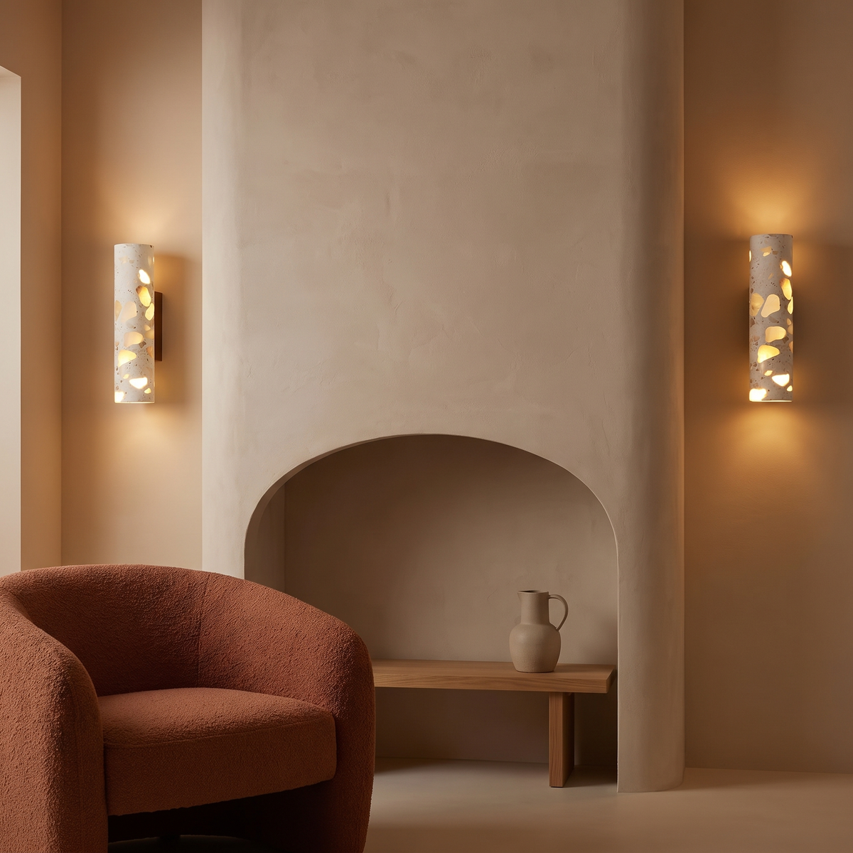 Pair of Hally terrazzo and walnut wall lights flanking a curved plaster niche