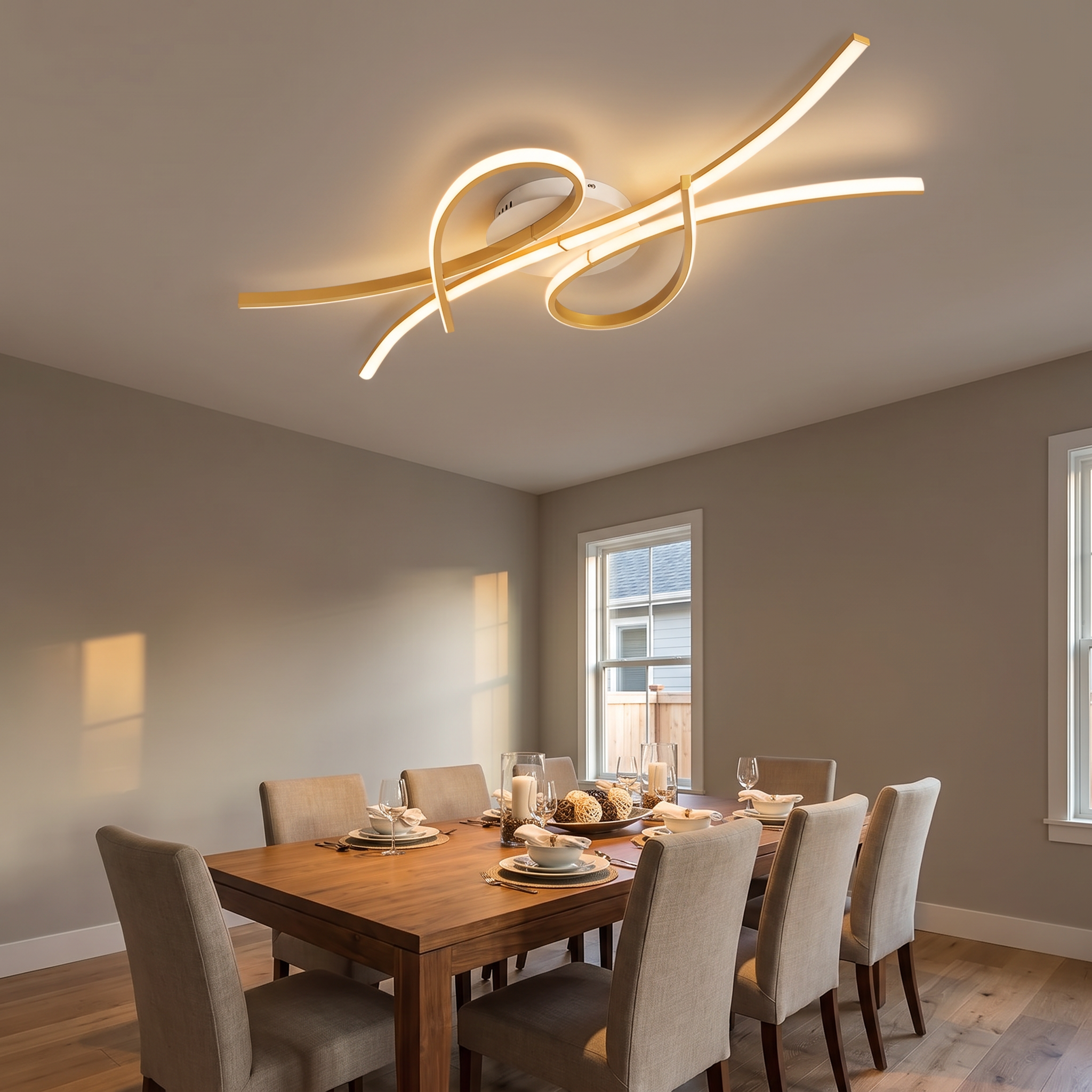 Gold Selina smart LED ceiling light above a dining table