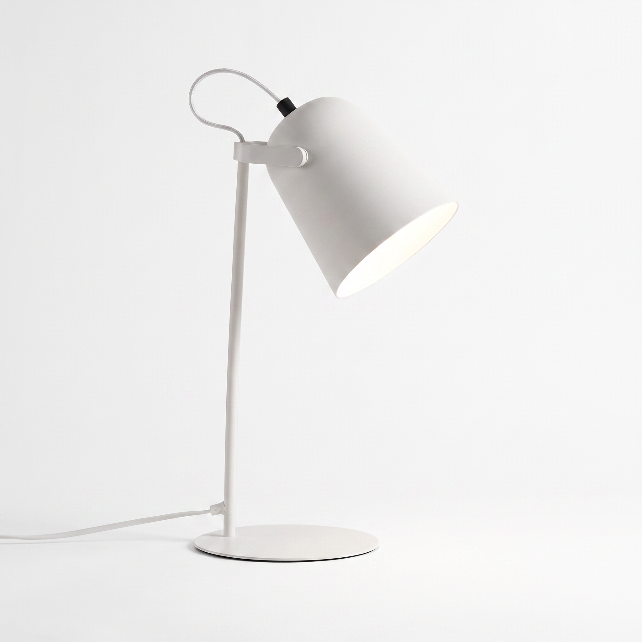 Hossegor matte macaron adjustable table lamp in white on a white background