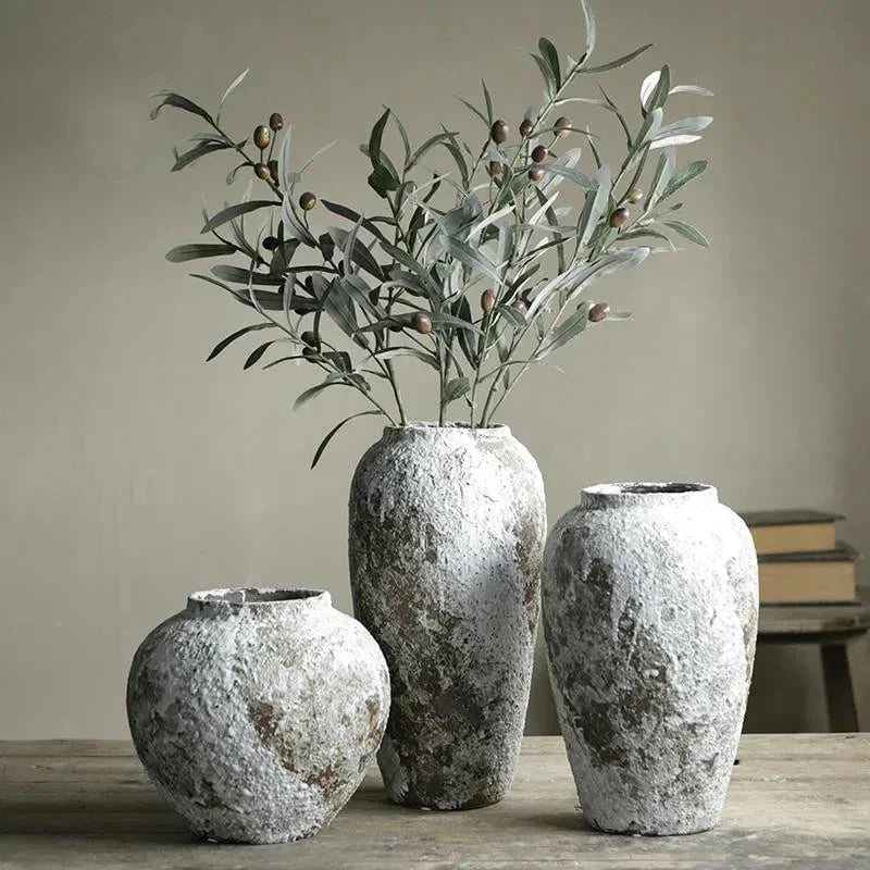 Keramas Ceramic Vase in the Oval, Round, and Bottle shapes displayed together