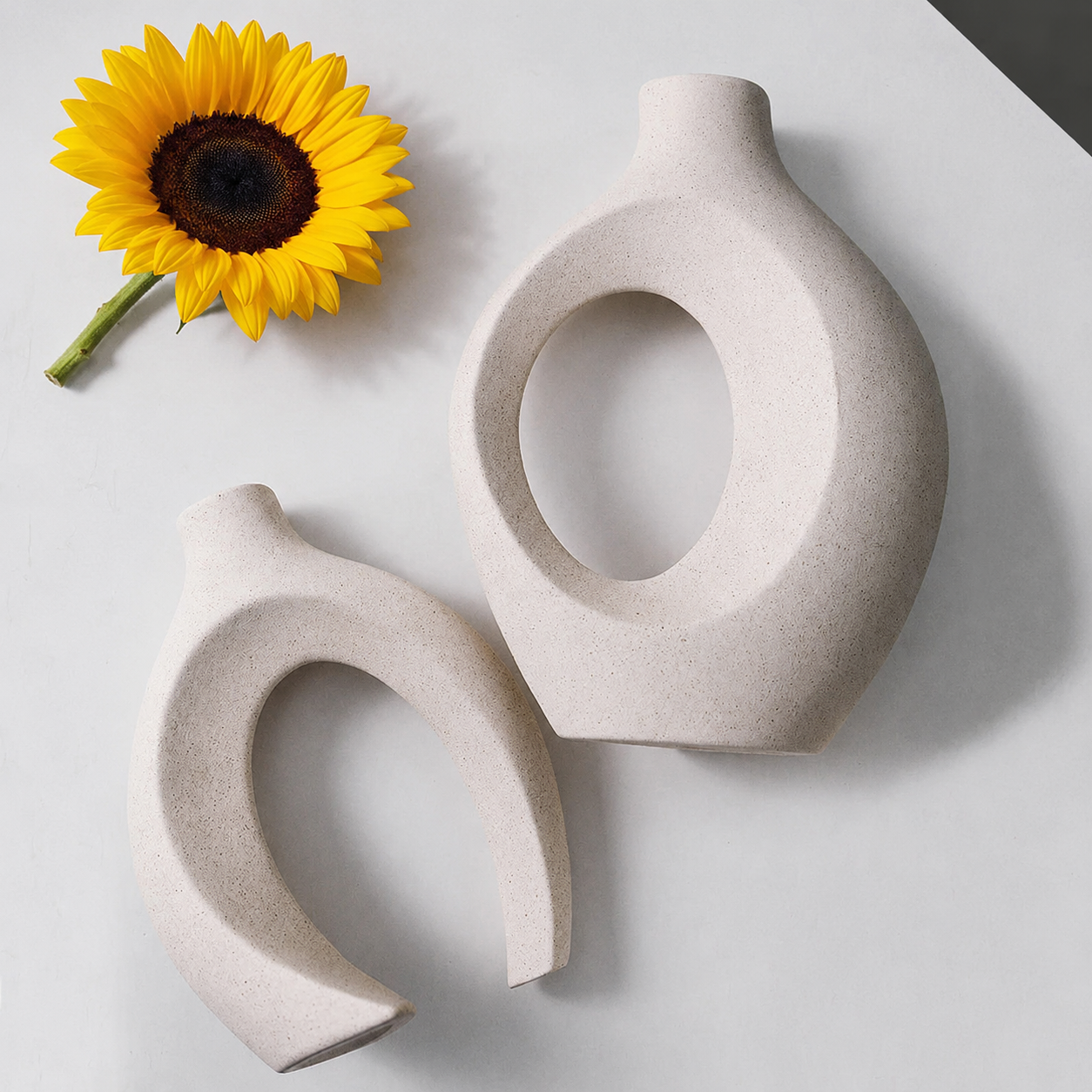 Lennox Ceramic Vase's narrow opening and stable flat base shown from the side