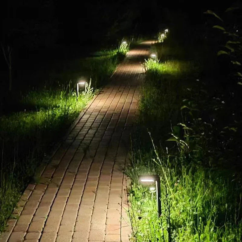 Lirena Solar Garden Lights styled among flower beds
