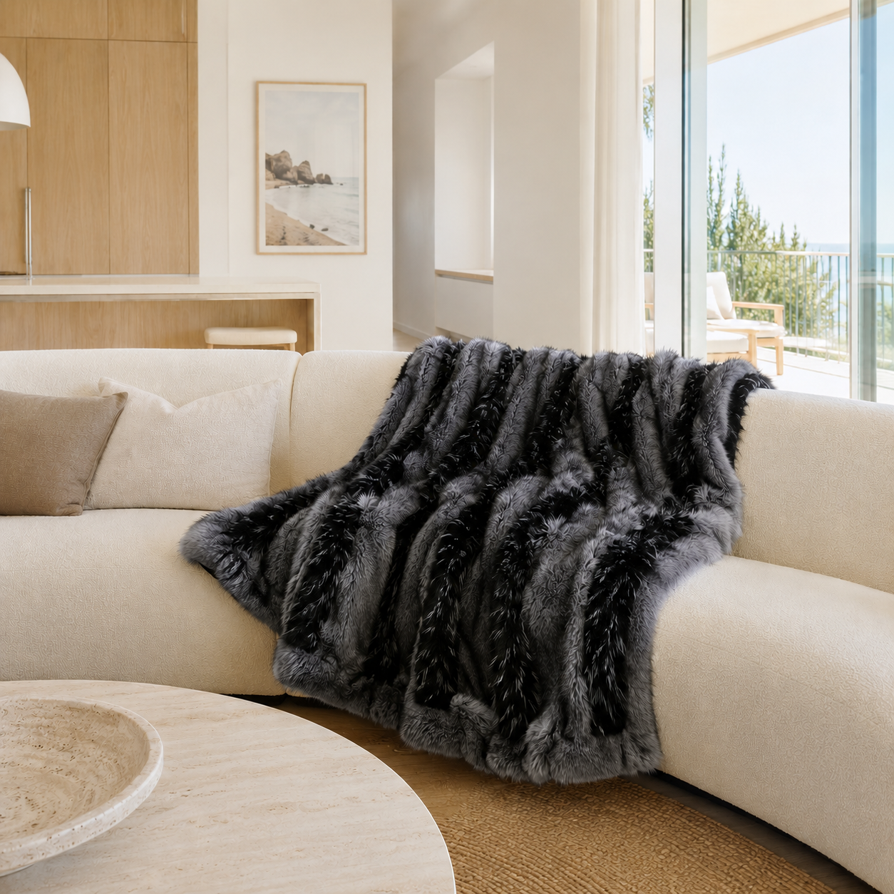 Lorne Faux Fur Blanket draped over a sofa in a living room setting